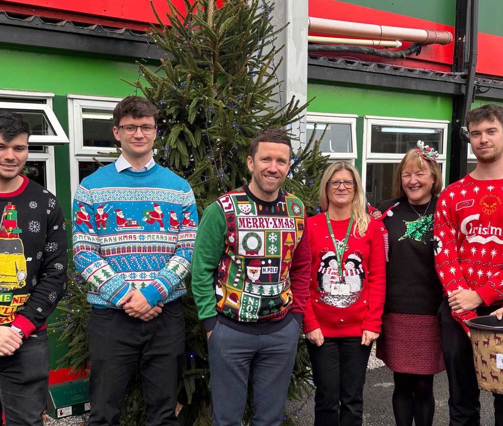 The TQEC team wearing Christmas Jumpers