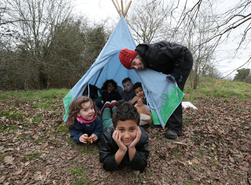 kids in a tent at Nature Nurture