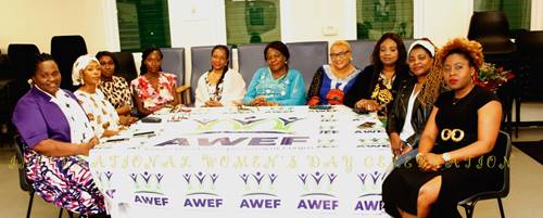 African Womens Empowerment members around a table