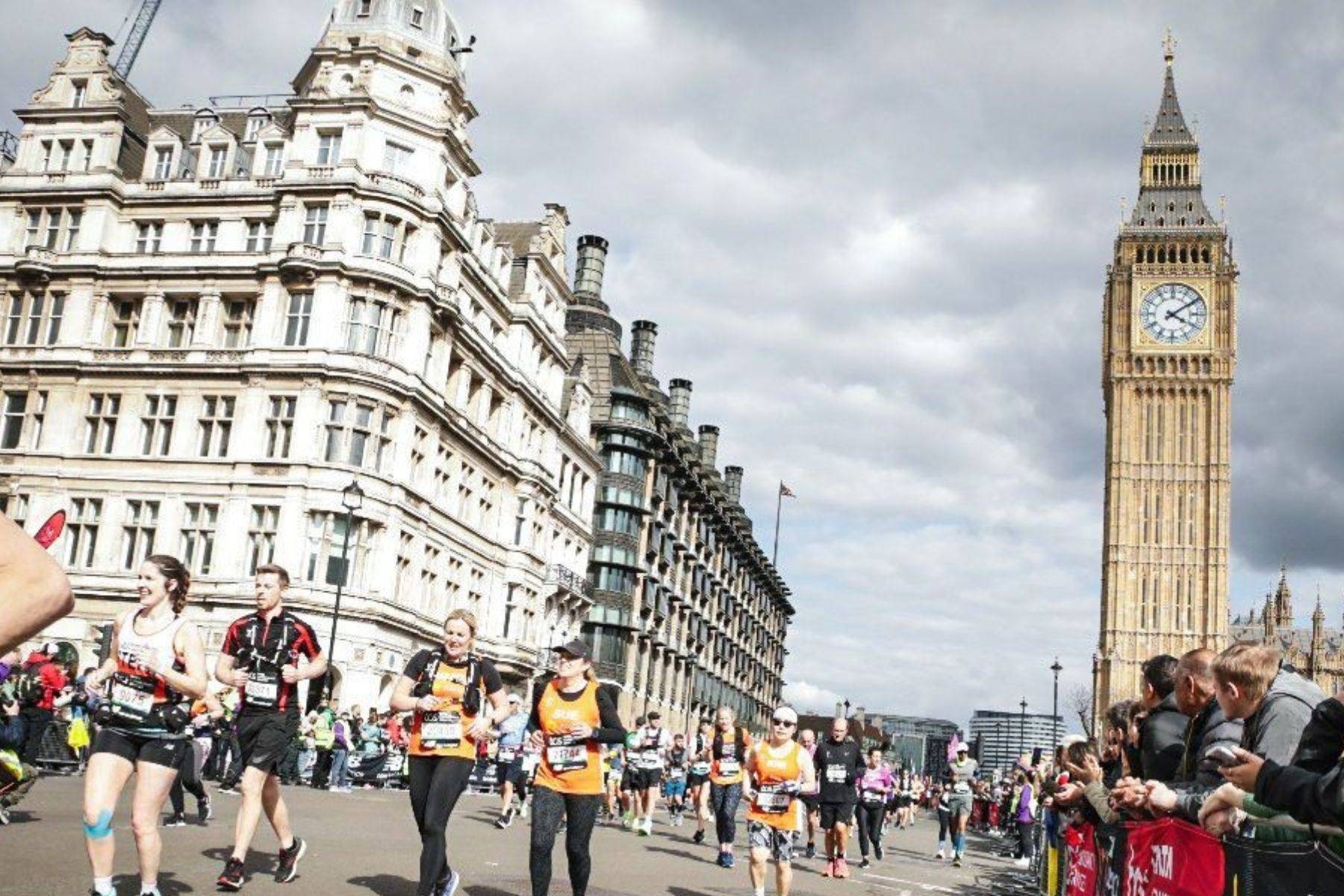  London Marathon runners are running past the Elizabeth Tower