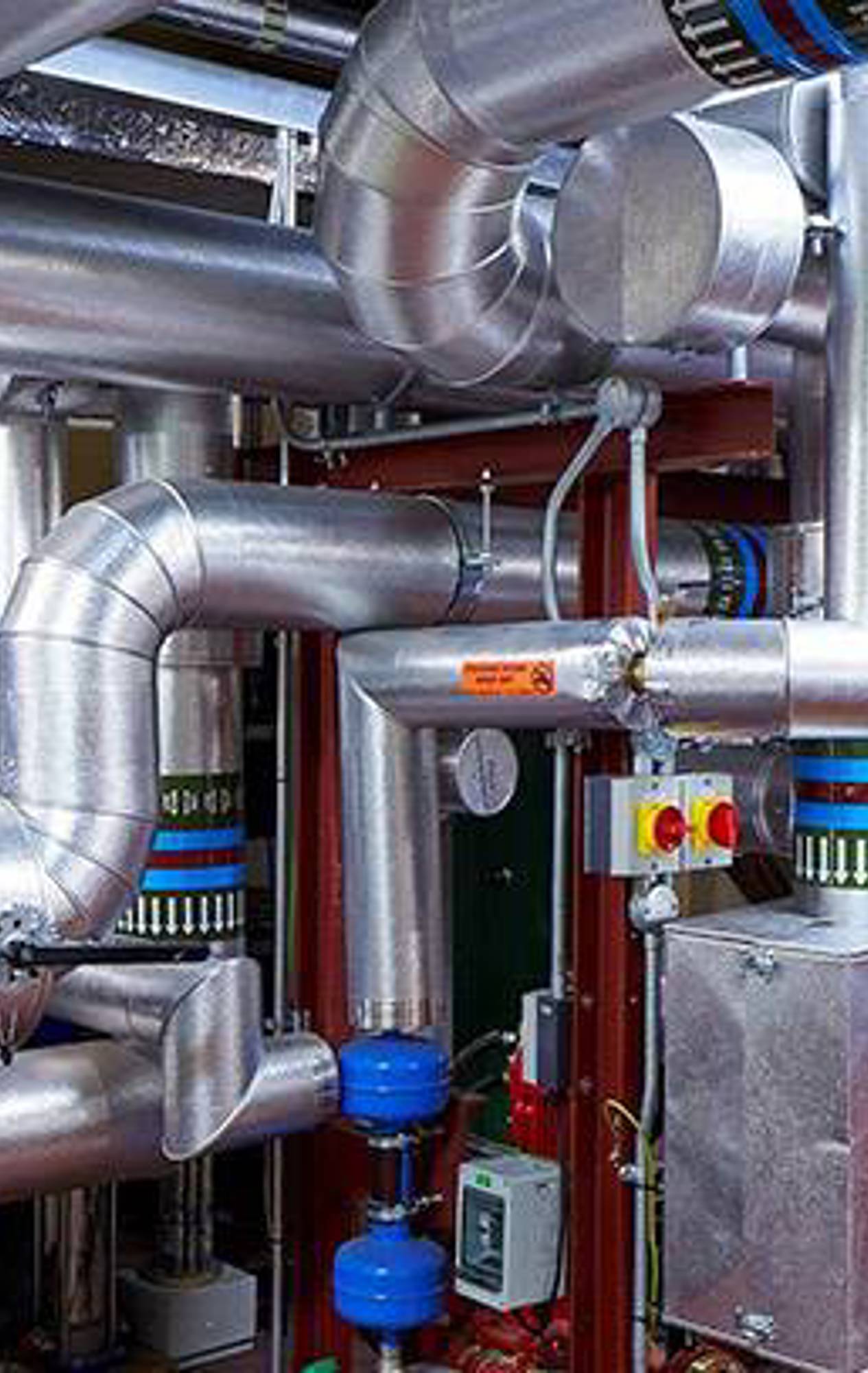 Victorian steam heating system with an efficient low temperature hot water system in the basement of Royal Albert Hall