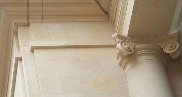 Detailed view of SouthGate Bath’s Georgian-inspired façade, featuring acid-etched, pigmented precast concrete.