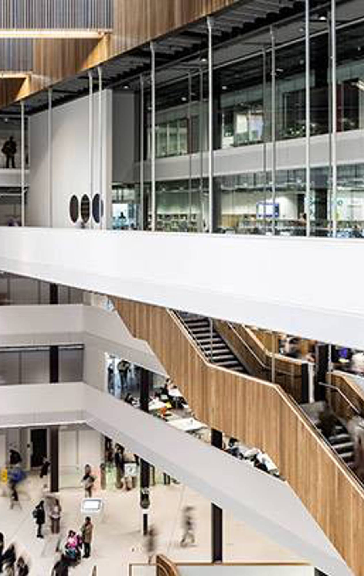 The seven-storey atrium of the Riverside Campus, featuring a sleek, minimalist design