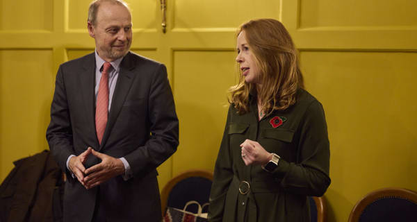 Sir Robert McAlpine Head of HR, Rachael Smith, makes a speech next to Sir Robert McAlpine CEO, Neil Martin