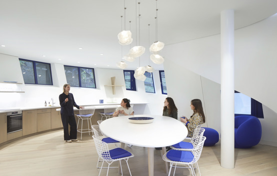 The kitchen and dining area in Maggie's Centre, featuring modern appliances and a welcoming layout.