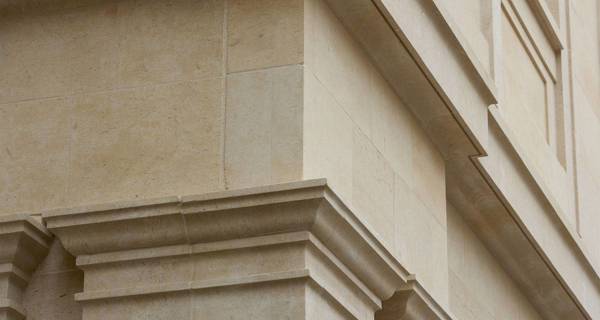 Detailed view of SouthGate Bath’s Georgian-inspired façade, featuring acid-etched, pigmented precast concrete.