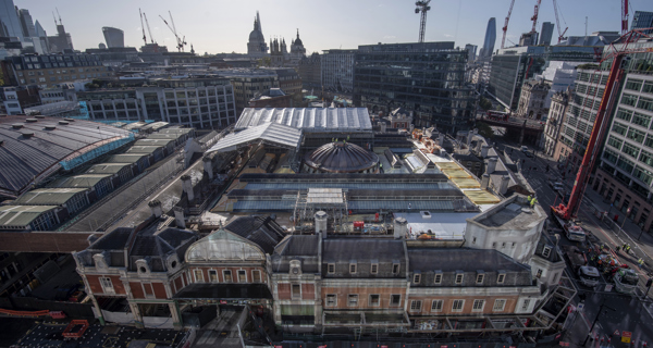 The installation of the occulus glass panel to the top of the dome above West Smithfield , thus sealing off the roof. October 14th 2023
