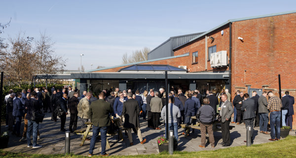 Local businesses interacting outside at the event