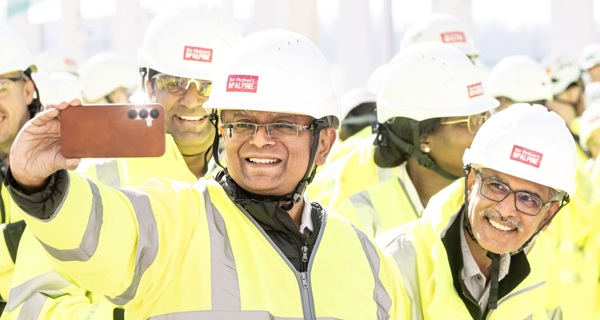 Team members pose for a selfie