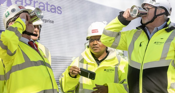 Works managers drink from the commemorative tankards