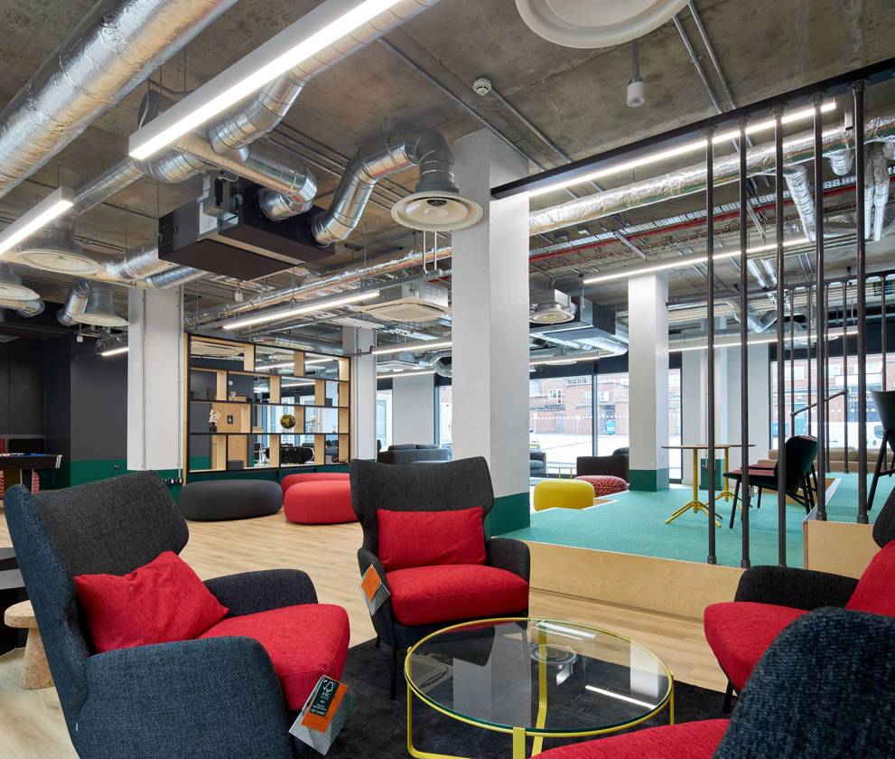 Modern communal lounge space at Project Sofia, with comfortable seating and natural light.