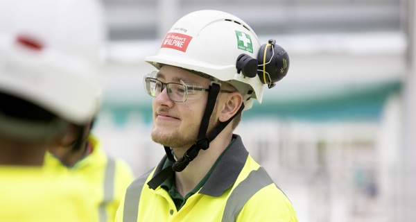 An SRM apprentice smiles at Agratas