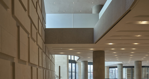 Close-up of decorative plasterwork and cornicing, showcasing the building’s historic craftsmanship.